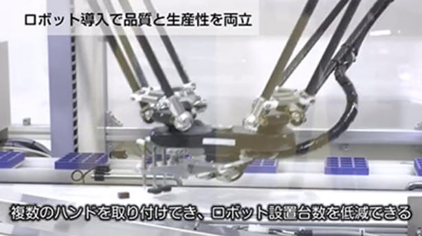 ロボットがコンベアと同期して高速箱詰めを実現